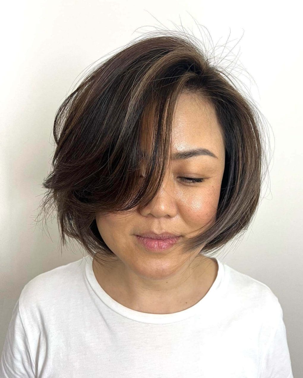 Chin Length Choppy Bob With Dark Brown Color — Layer Bob
