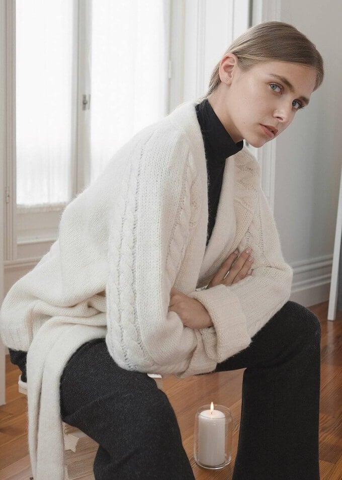 Cream Chunky Knit Cardigan Over Black Turtleneck Cream Chunky Knit Cardigan Over Black Turtleneck — Layered Ideas