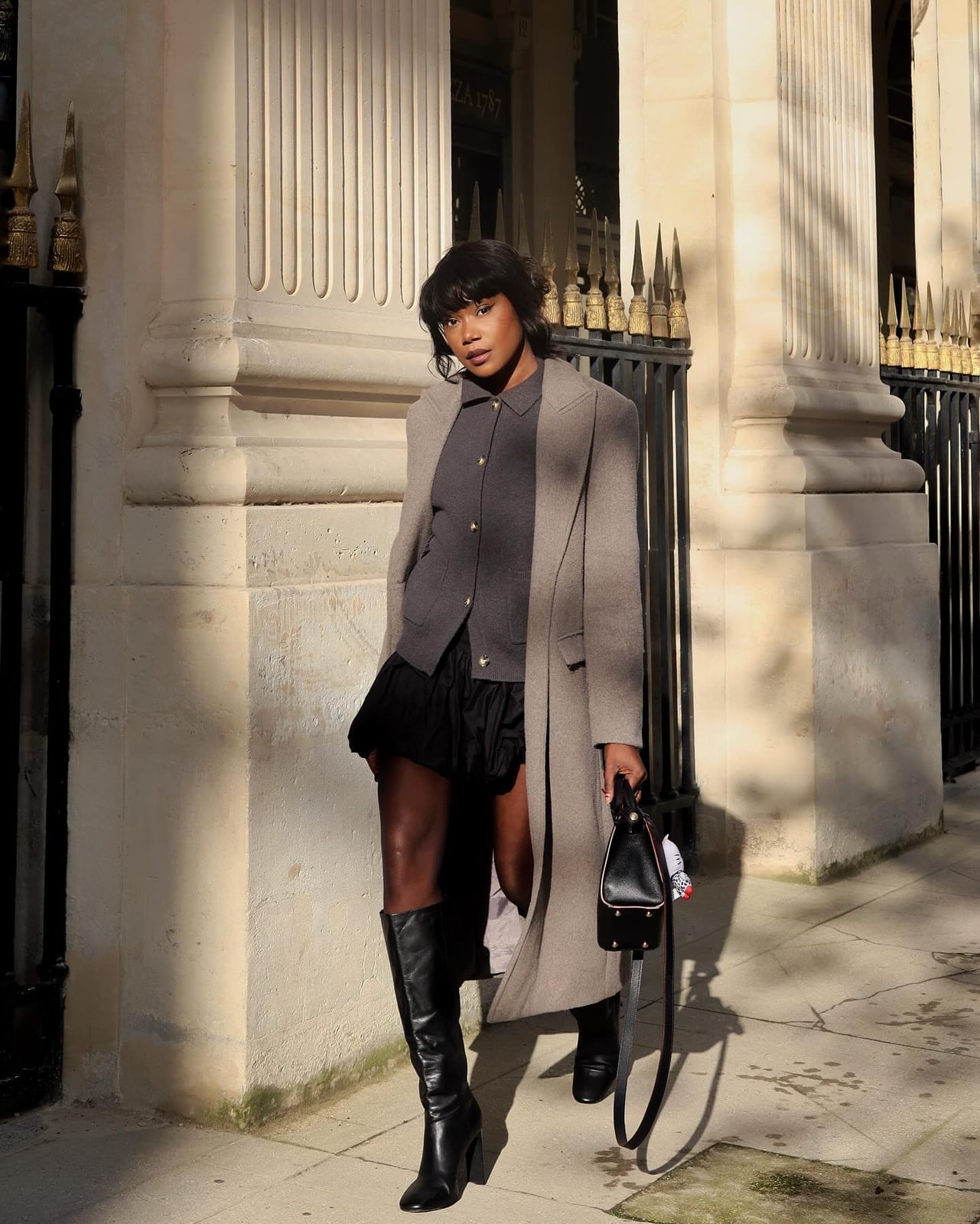 Beige Coat Over Gray Layers and Mini Skirt Beige Coat Over Gray Layers and Mini Skirt — Layered Ideas