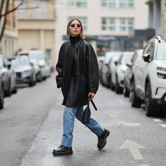 An Oversized Black Leather Jacket With Light Wash Jeans An Oversized Black Leather Jacket With Light Wash Jeans — Leather Outfits