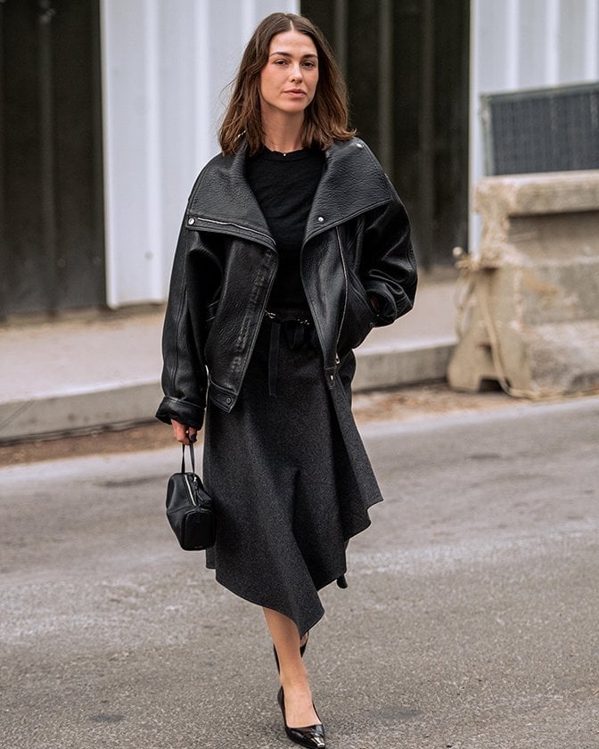 An Oversized Black Leather Jacket With A Gray Midi Skirt An Oversized Black Leather Jacket With A Gray Midi Skirt — Leather Outfits