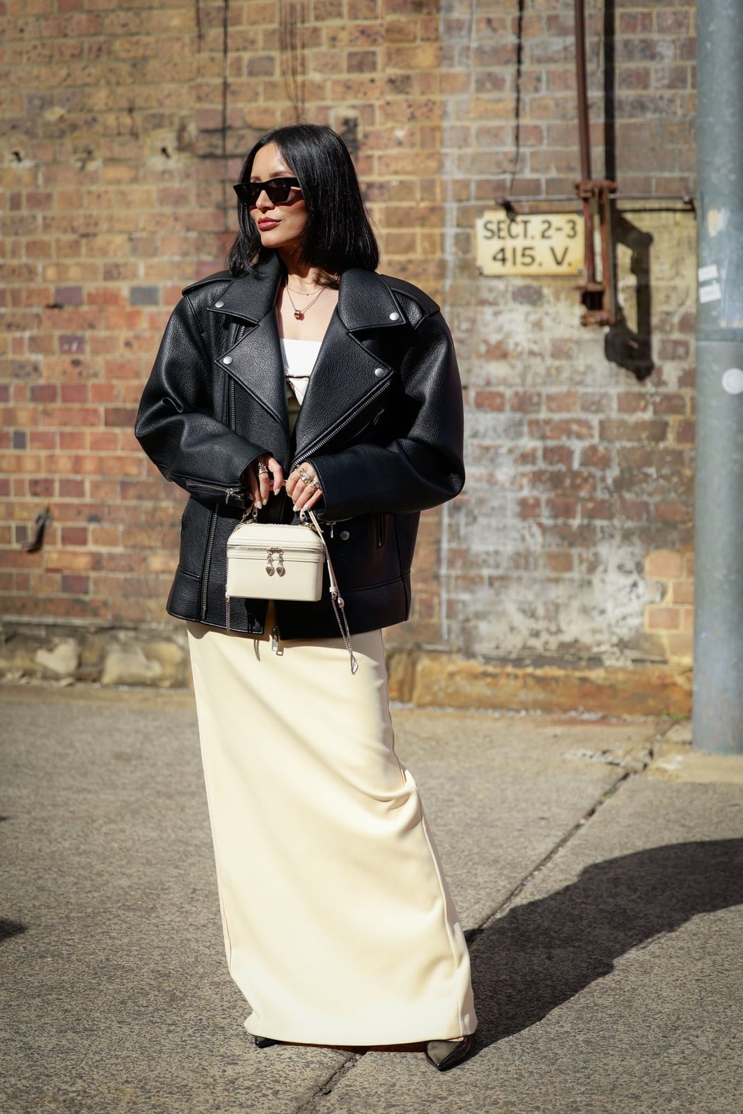 An Oversized Black Leather Biker Jacket An Oversized Black Leather Biker Jacket — Leather Outfits