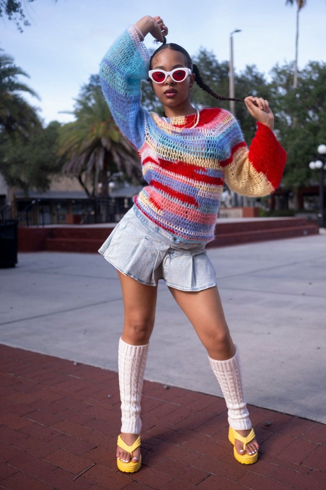 White Leg Warmers with a Rainbow Crochet Sweater and Denim Skirt — Leg Warmers Outfits