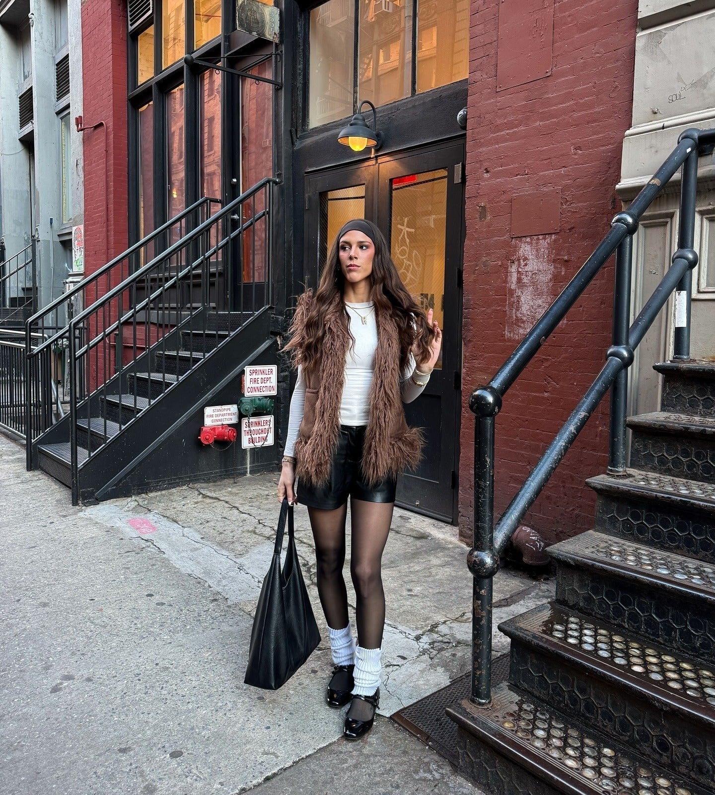 White Leg Warmers with a Faux Fur Vest and Black Shorts — Leg Warmers Outfits