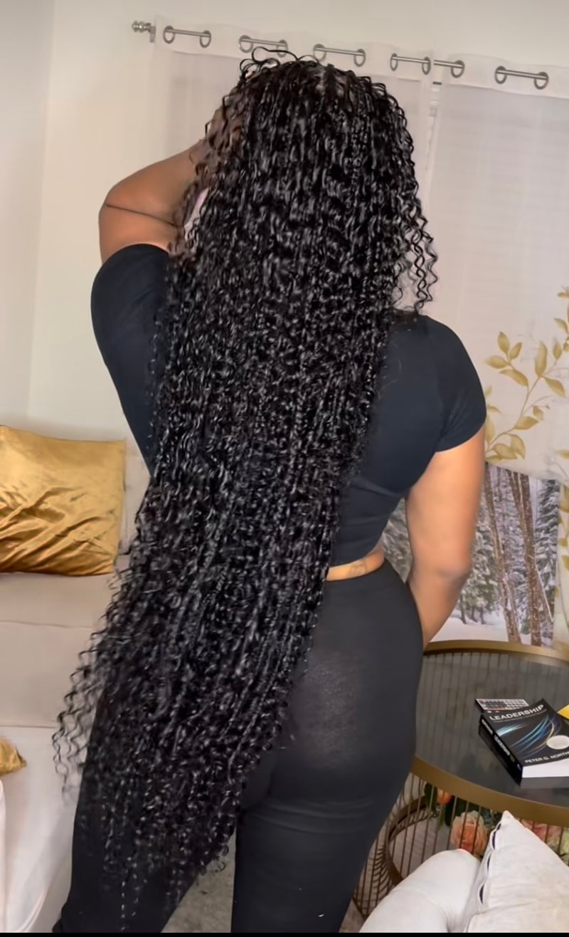 Waist-Length Wavy Knotless Braids With Extreme Length Waist-Length Wavy Knotless Braids With Extreme Length — Length Braids