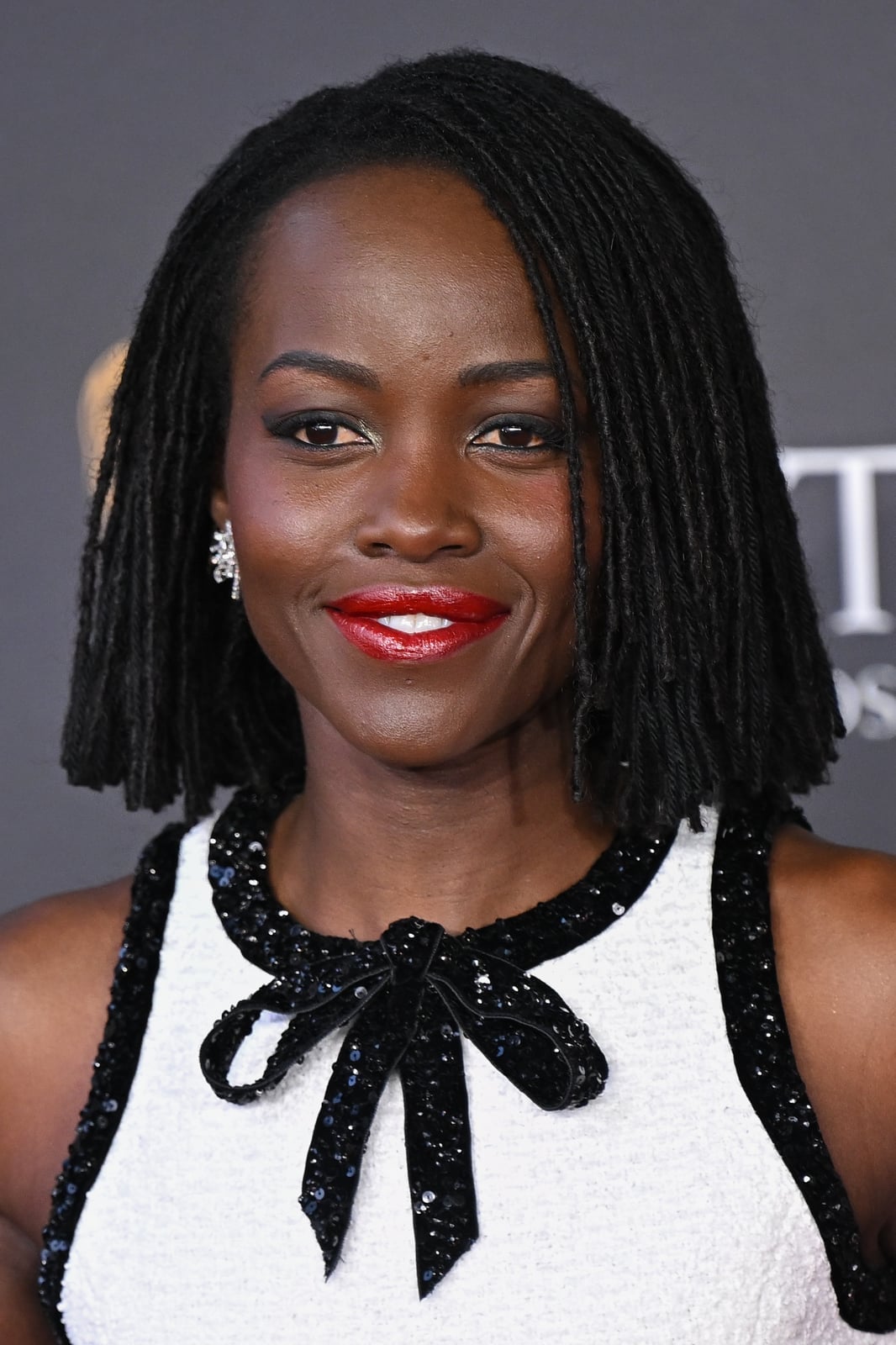 Wavy Black Locs With Auburn Highlights — Length Locs