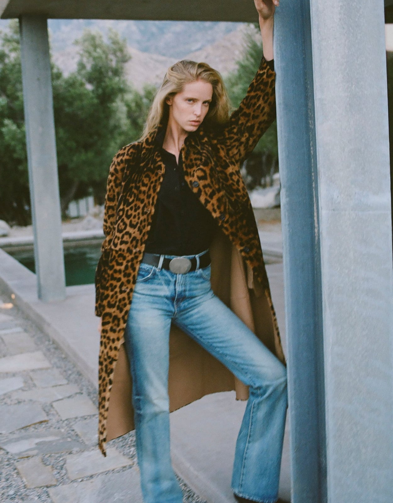 Oversized Leopard Coat Over Black Polo and Jeans — Leopard Print Outfits