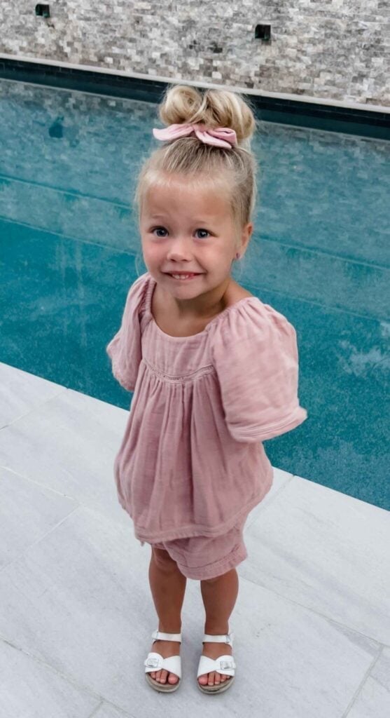 Mid-Back High Bun With Pink Bow Mid-Back High Bun With Pink Bow — Little Girl Hairstyles