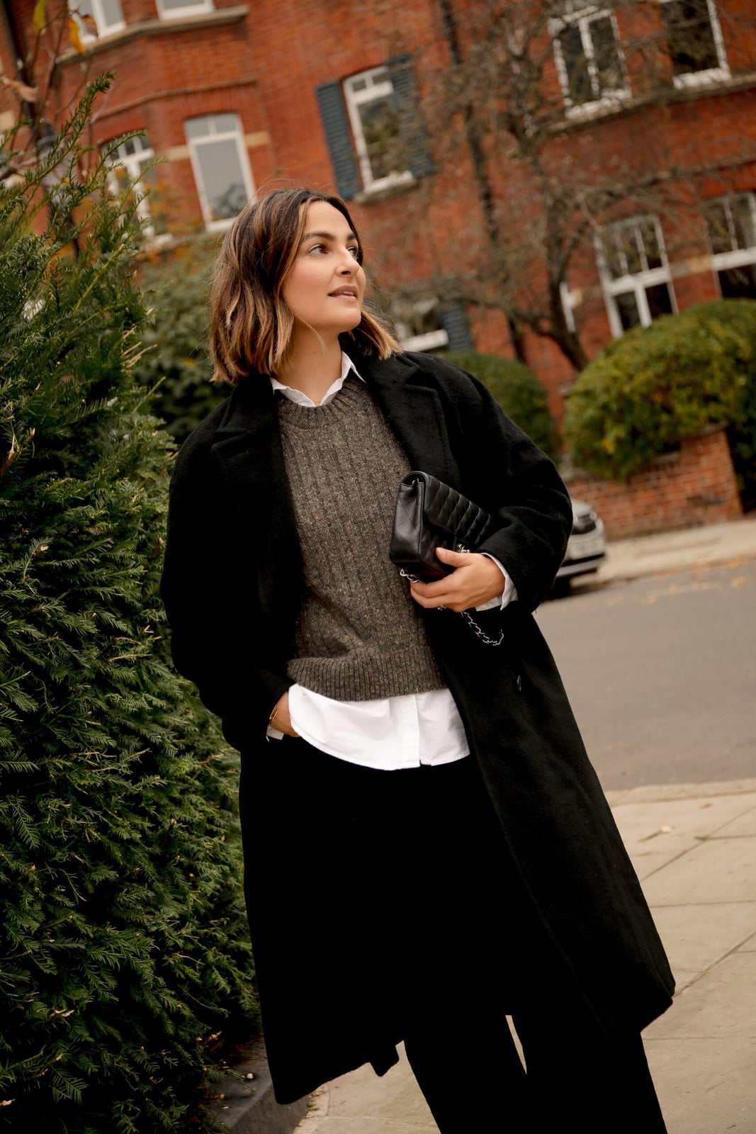 Black Wool Coat with Gray Sweater and Trousers Black Wool Coat with Gray Sweater and Trousers — London Outfits