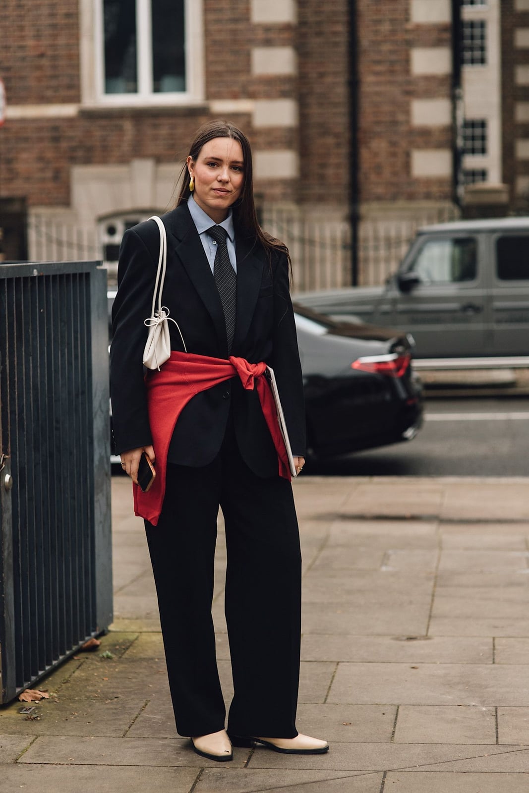 Oversized Navy Suit with Red Sweater Accent Oversized Navy Suit with Red Sweater Accent — London Outfits