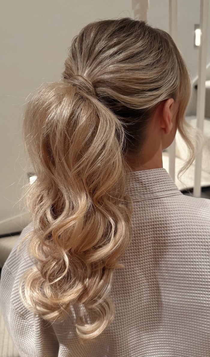 Honey Blonde Low Ponytail Voluminous Curls — Low Ponytail Hairstyles