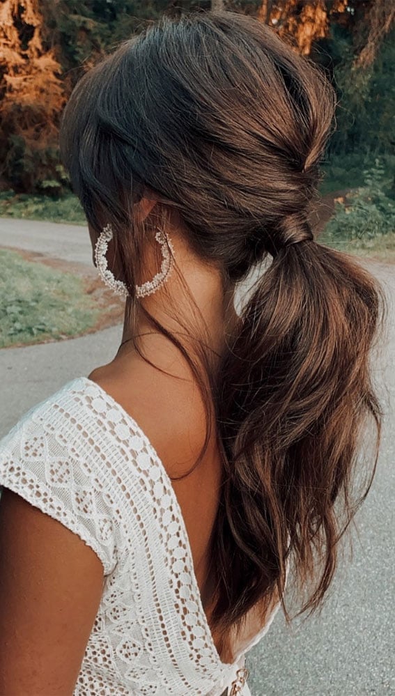 Twisted Low Ponytail Thick Wavy Dark Brown — Low Ponytail Hairstyles