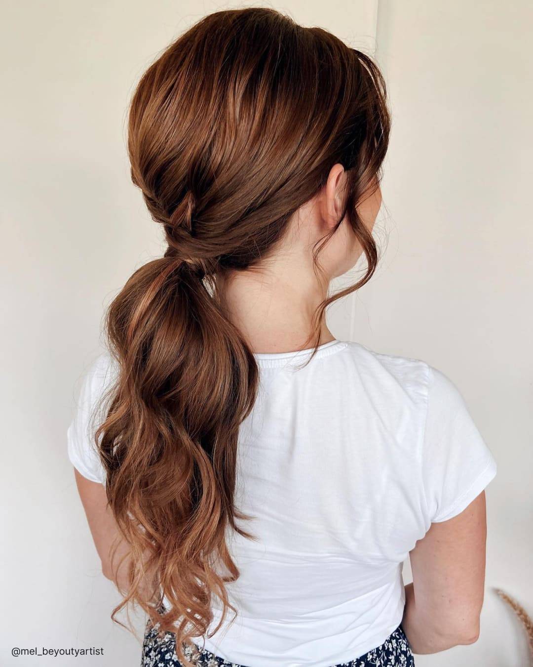Auburn Low Ponytail Voluminous Waves — Low Ponytail Hairstyles