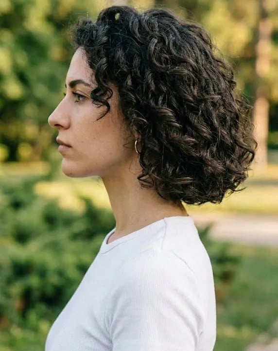 Side Parted Collarbone Bob — Medium Curly Hair