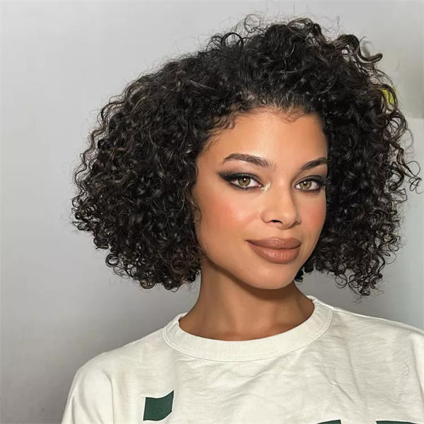 Chin Length Black Bob With Defined Curls — Medium Curly Hair