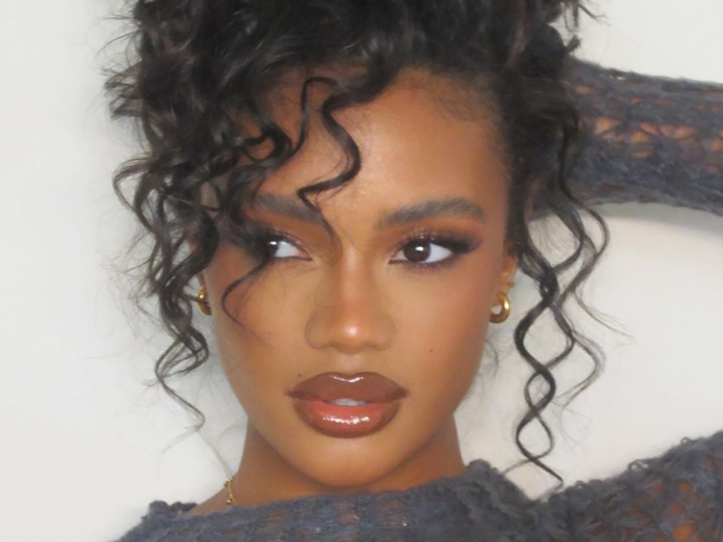 Shoulder Length With Wispy Bangs and Dark Brown With Subtle Highlights — Medium Curly Hair