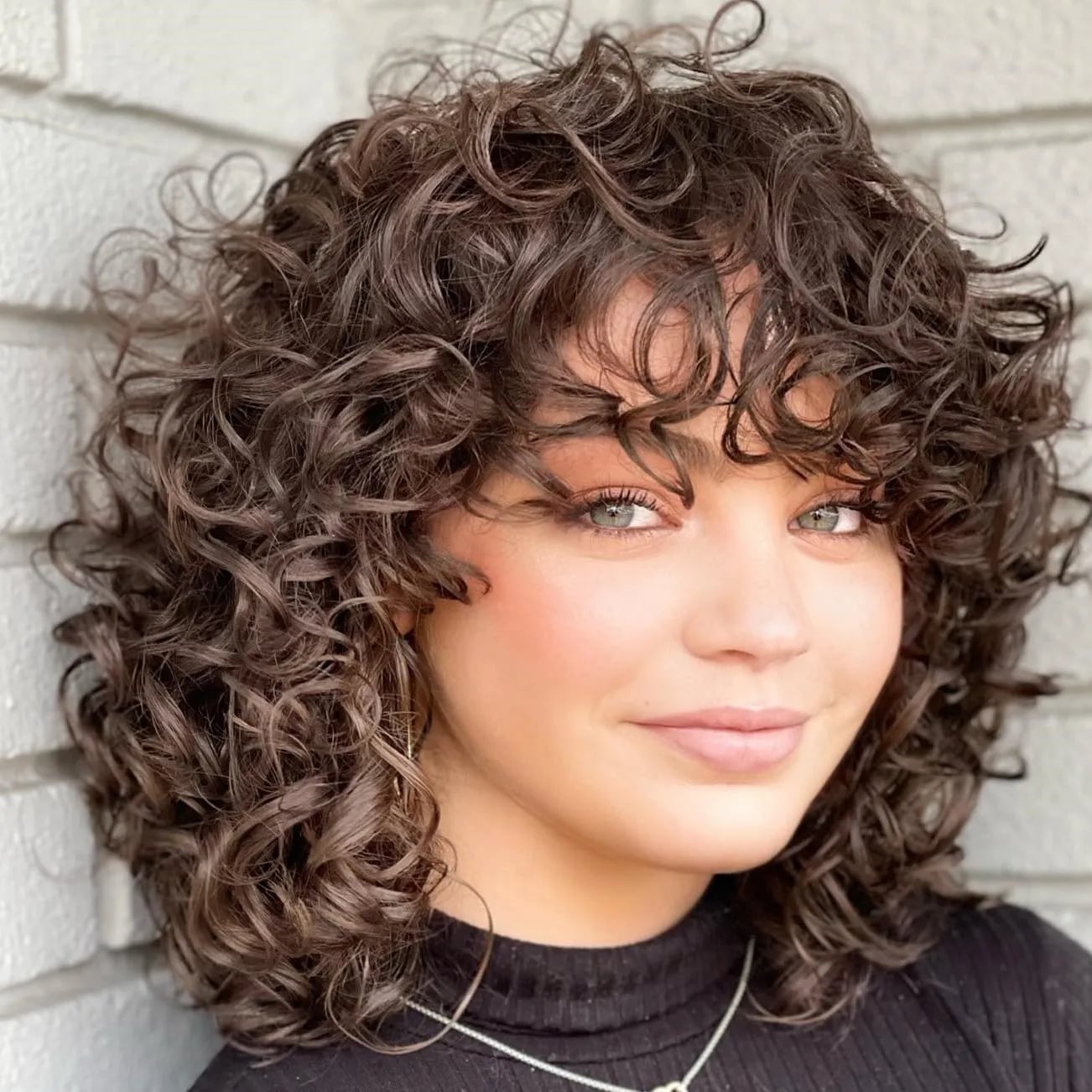 Mid-Back Curly Layers With Highlights — Medium Curly Hair