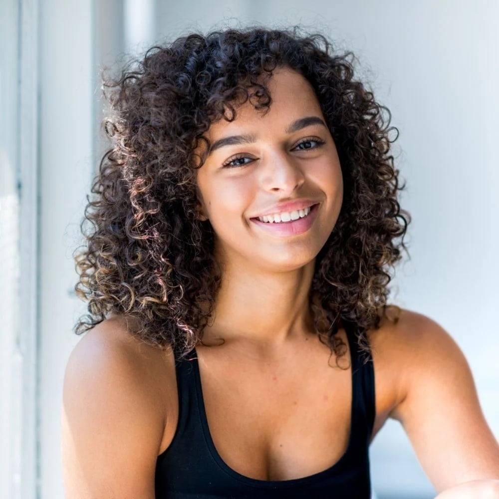 Dark Brown Pixie Cut With Short Bangs — Medium Curly Hair