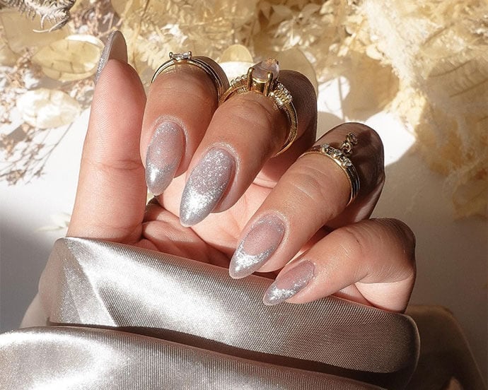 Short Almond Nude Glitter Silver French Tips — Metallic Nails