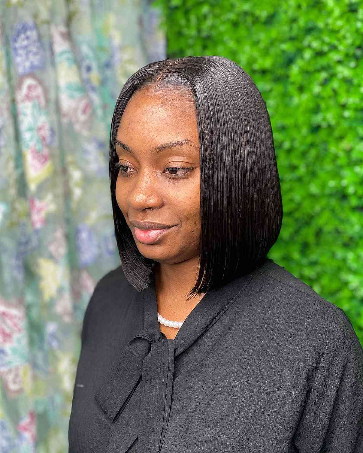 Sleek Collarbone Black Bob — Middle Part Bob