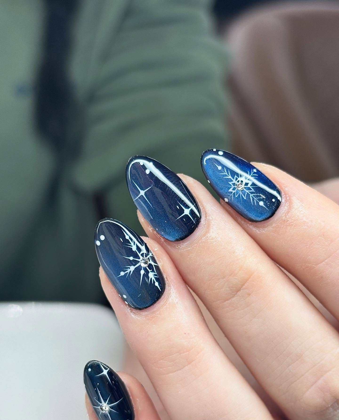 Midnight Blue Snowflake Almond Nails