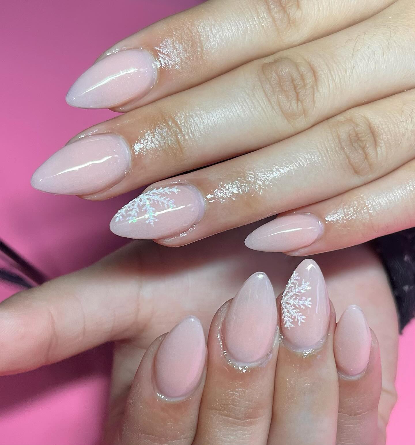 Milky Pink Almond Nails With White Snowflake Art