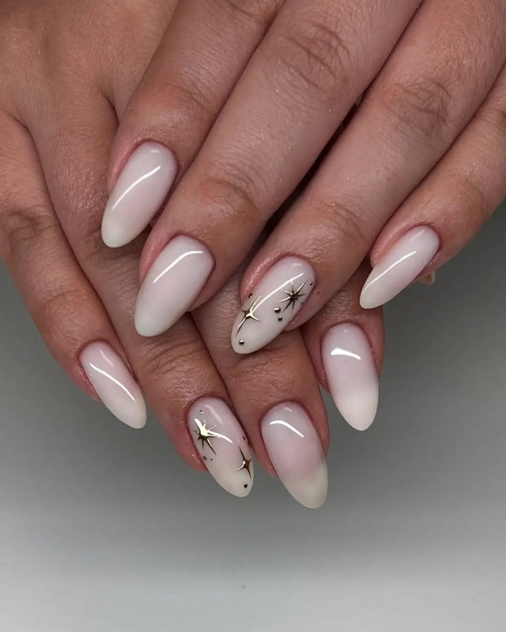 Medium Almond Celestial Accent Nails, Close-Up Take Medium Almond Celestial Accent Nails, Close-Up Take — Milky White Nails