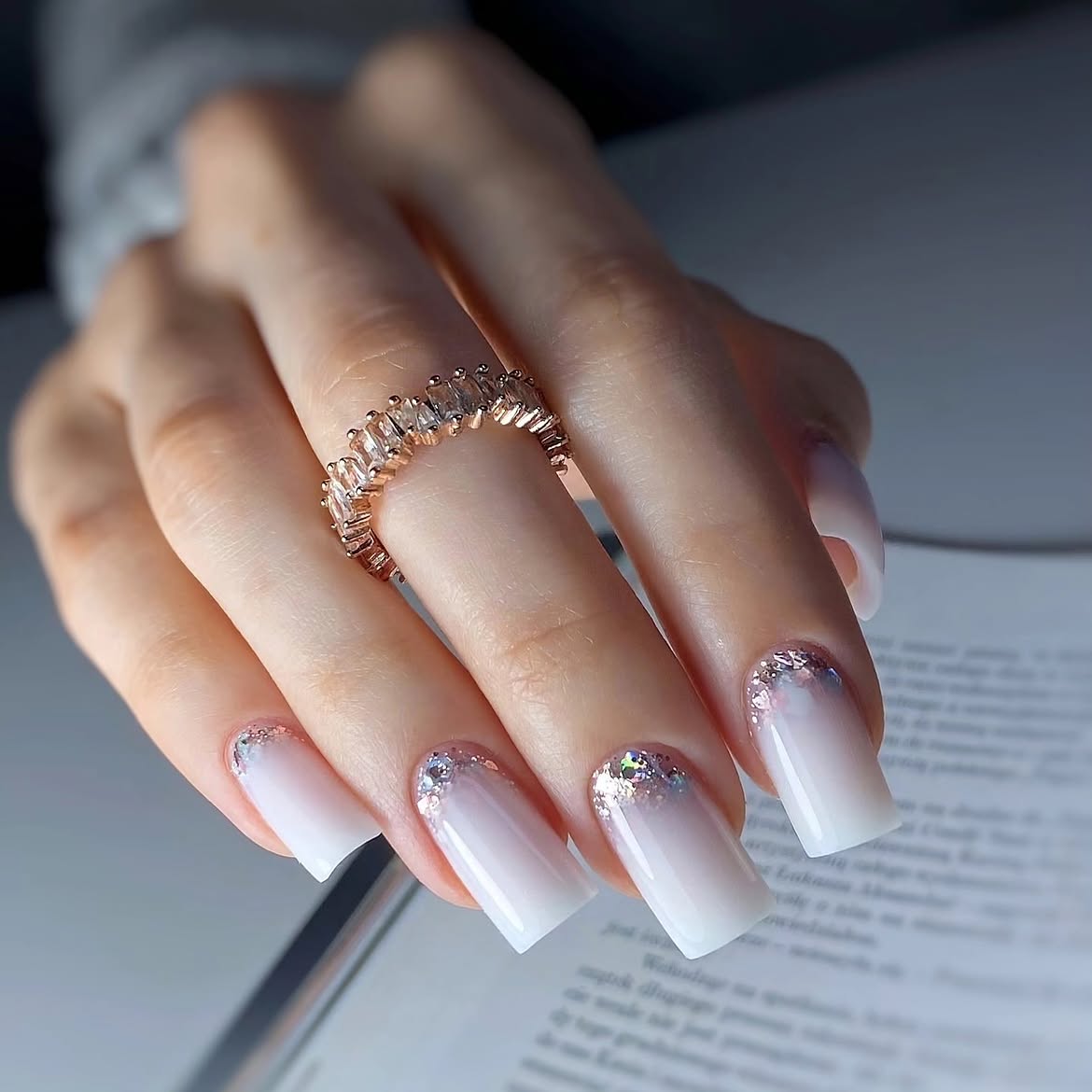 Milky White Ombre French Tip Nails with Glitter Accent