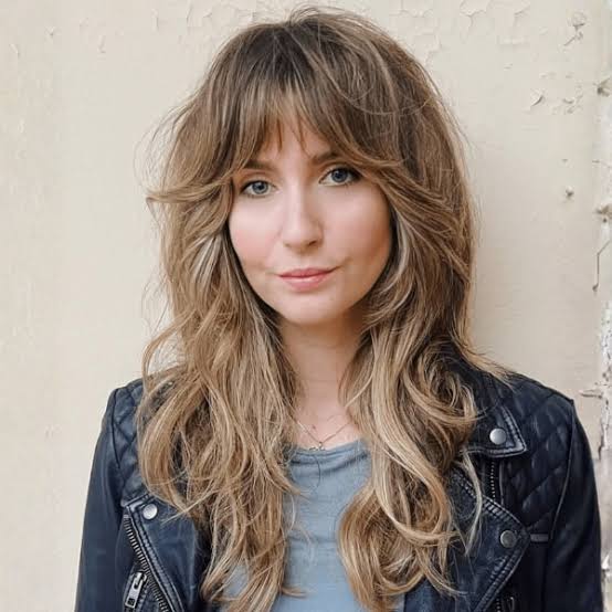 Honey Blonde Shag With Face-Framing Layers Honey Blonde Shag With Face-Framing Layers — Modern Shag
