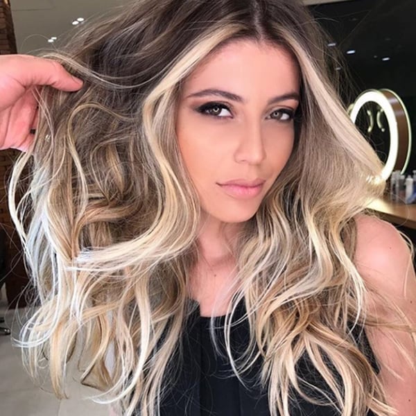 Collarbone Layers With Bold Blonde Money Piece