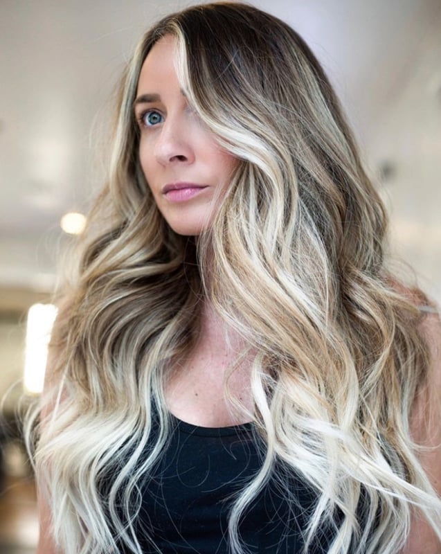 Mid-Back Layers With Bright Blonde Money Piece and Face-Framing Pieces