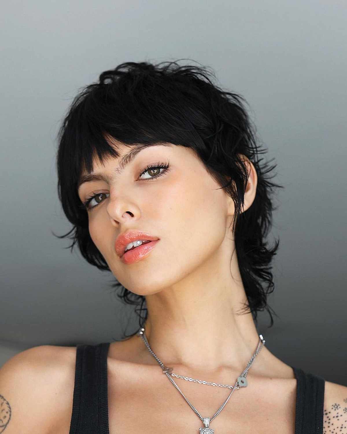 Black Ear Length Mullet With Textured Layers — Mullet Hairstyles