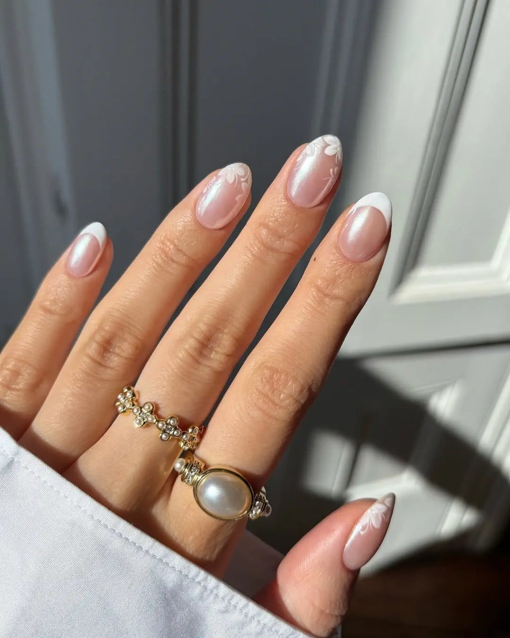 Sheer Nude Short Oval Nails With White Floral Accents — Nail Designs