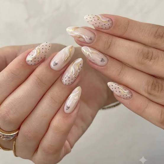 Long Almond Nails With Mixed Patterns — Nail Designs