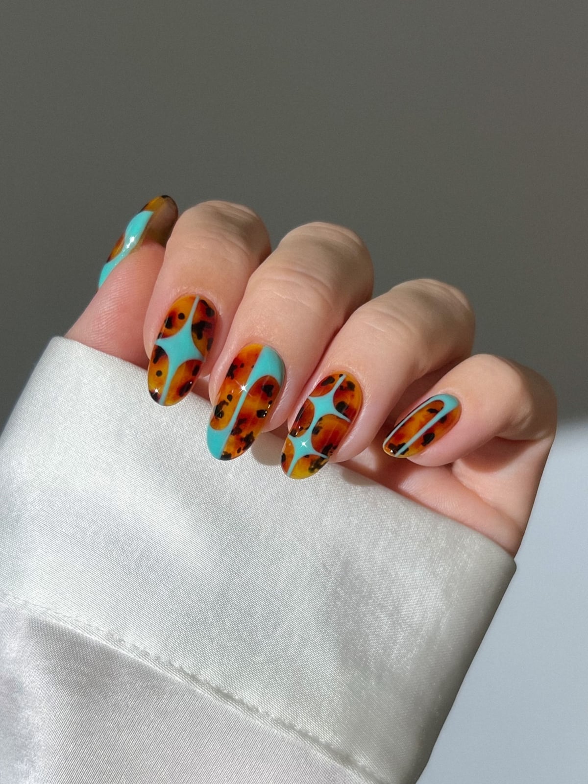 Medium Oval Nails With Tortoiseshell And Turquoise — Nail Designs