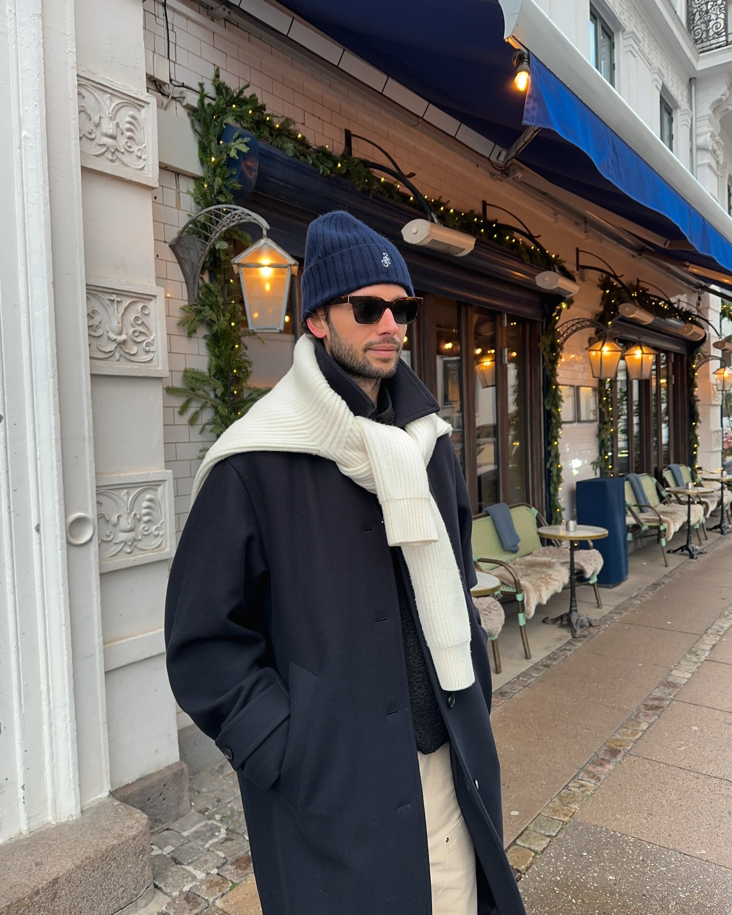 Navy Peacoat With Cream Scarf and Beige Trousers