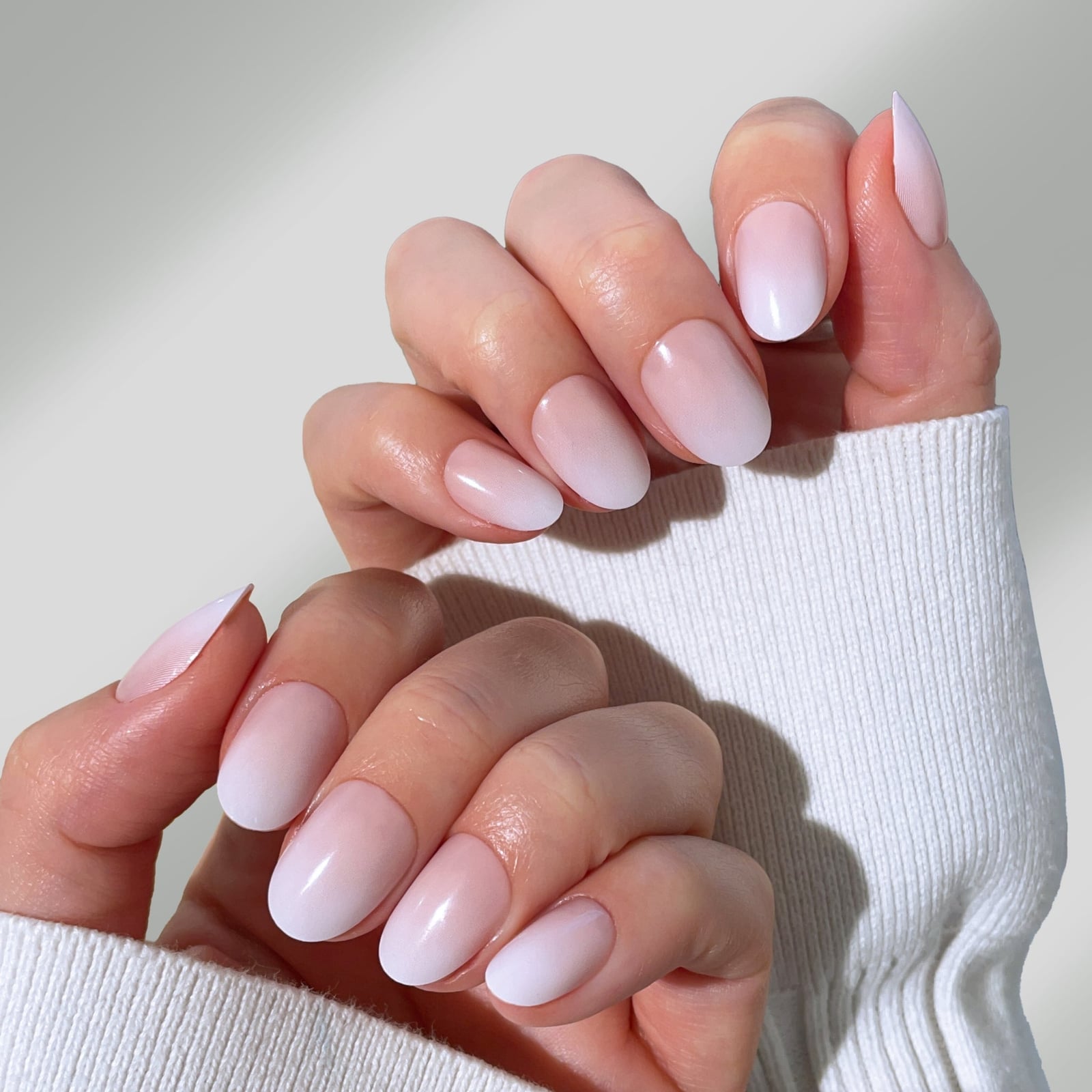 Milky White to Pale Pink Ombre Short Almond Nails, Close-Up Take — Neutral Nails Colors