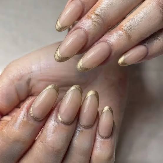 Medium Oval Nude Gold Glitter French — New Years Eve Nails