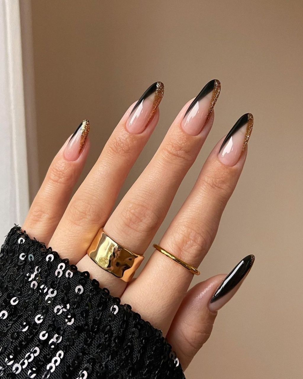 Long Almond Black French Tip Gold Glitter Nails — New Years Eve Nails
