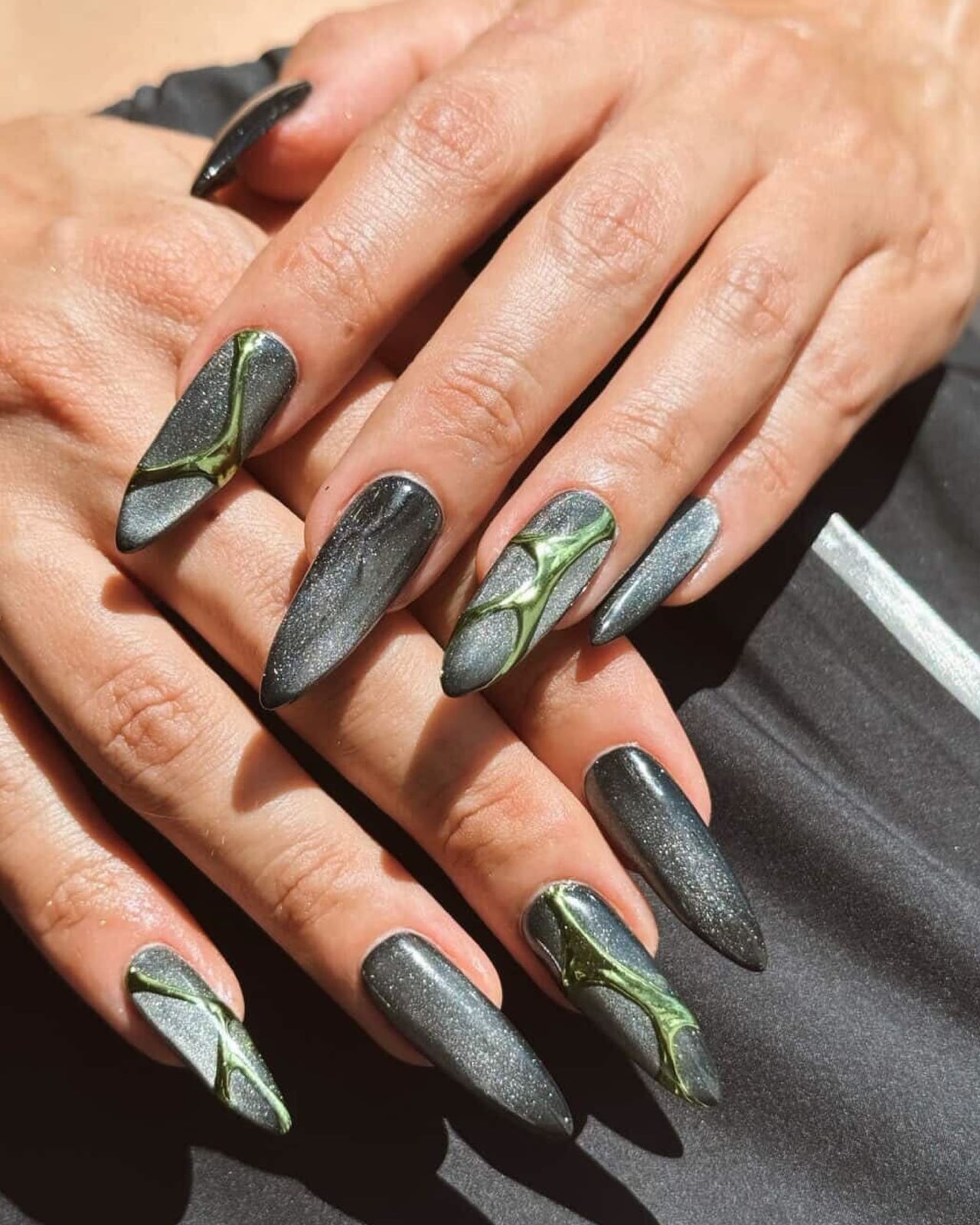 Long Stiletto Charcoal Cat-Eye Green Abstract — New Years Eve Nails