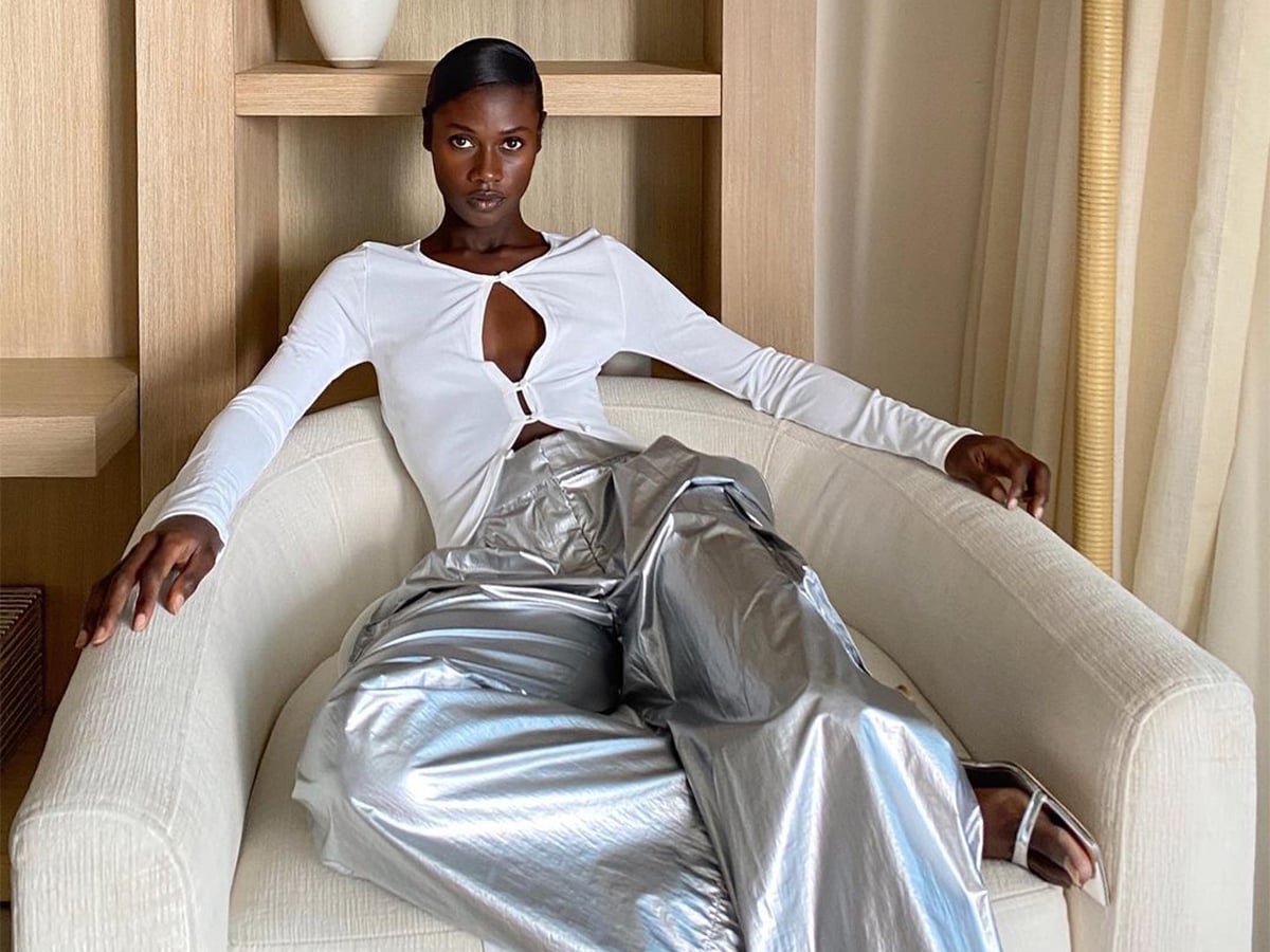 White cutout top with silver metallic wide-leg pants — New Years Outfit