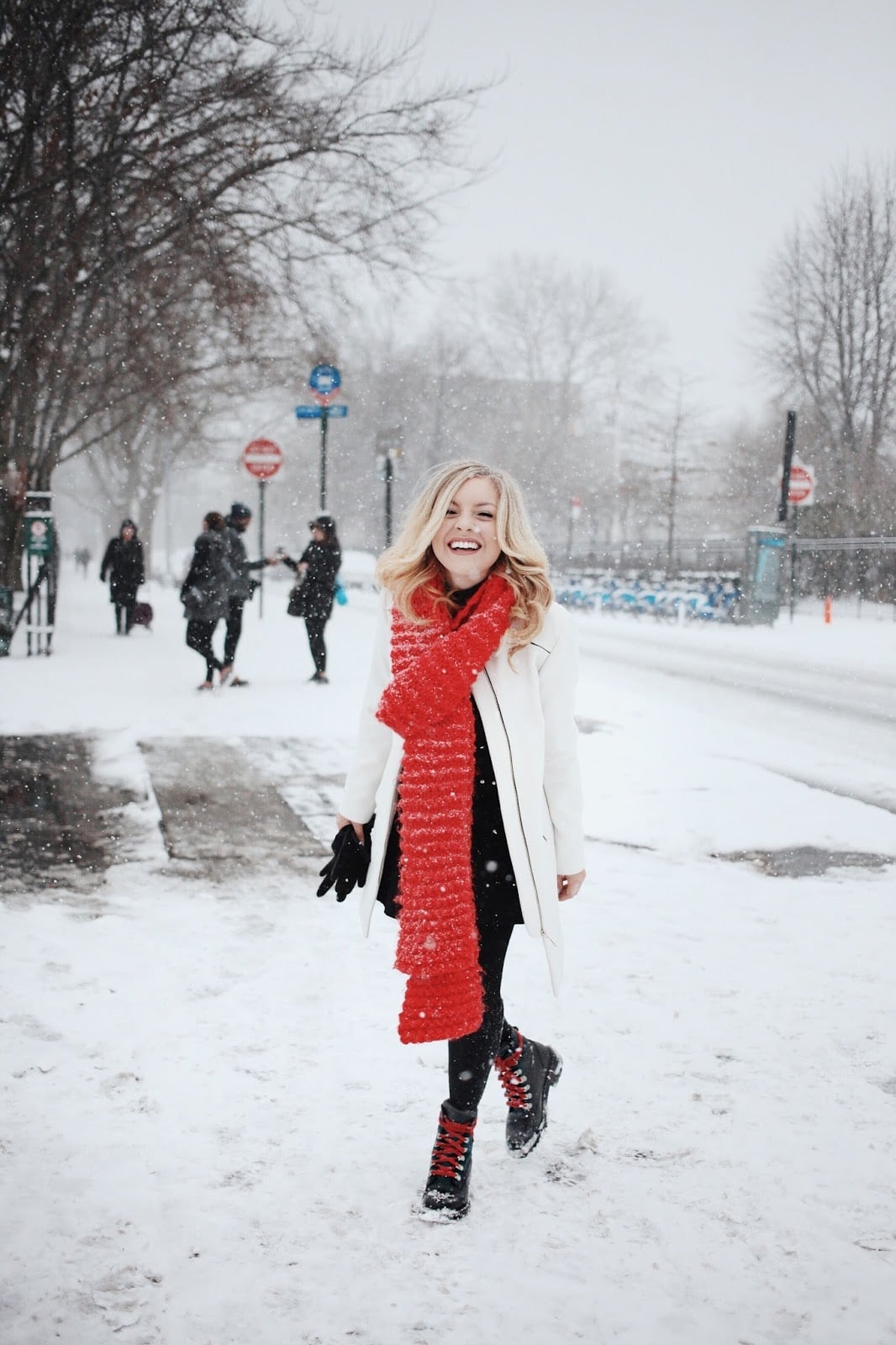 White Coat with Vibrant Red Scarf — New York Winter Outfit