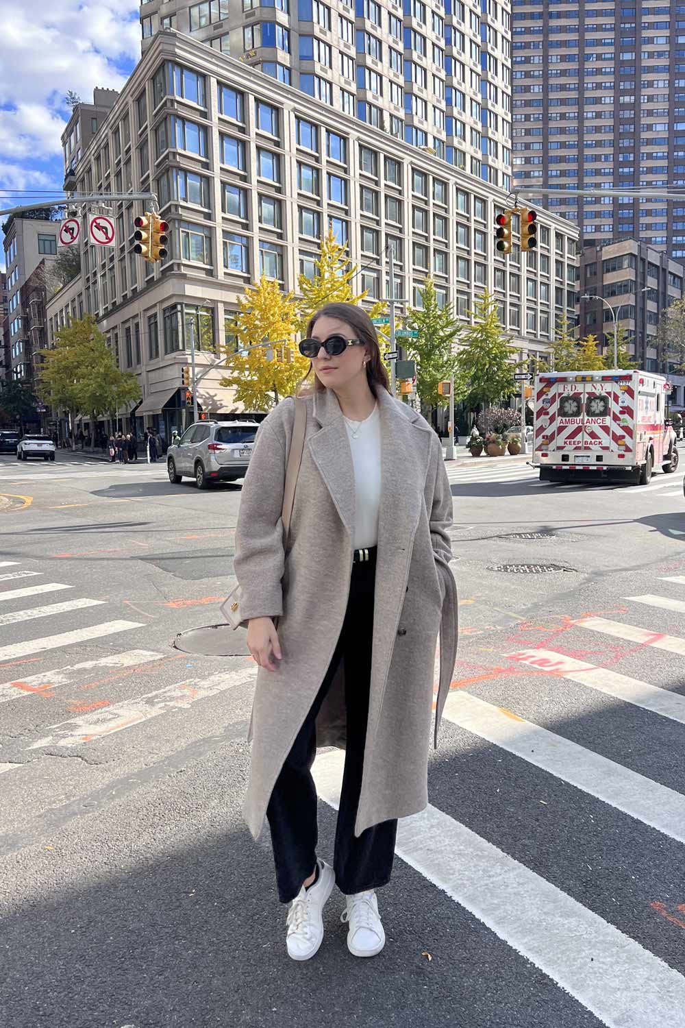 Beige Wool Coat with White Sweater and Black Trousers — New York Winter Outfit