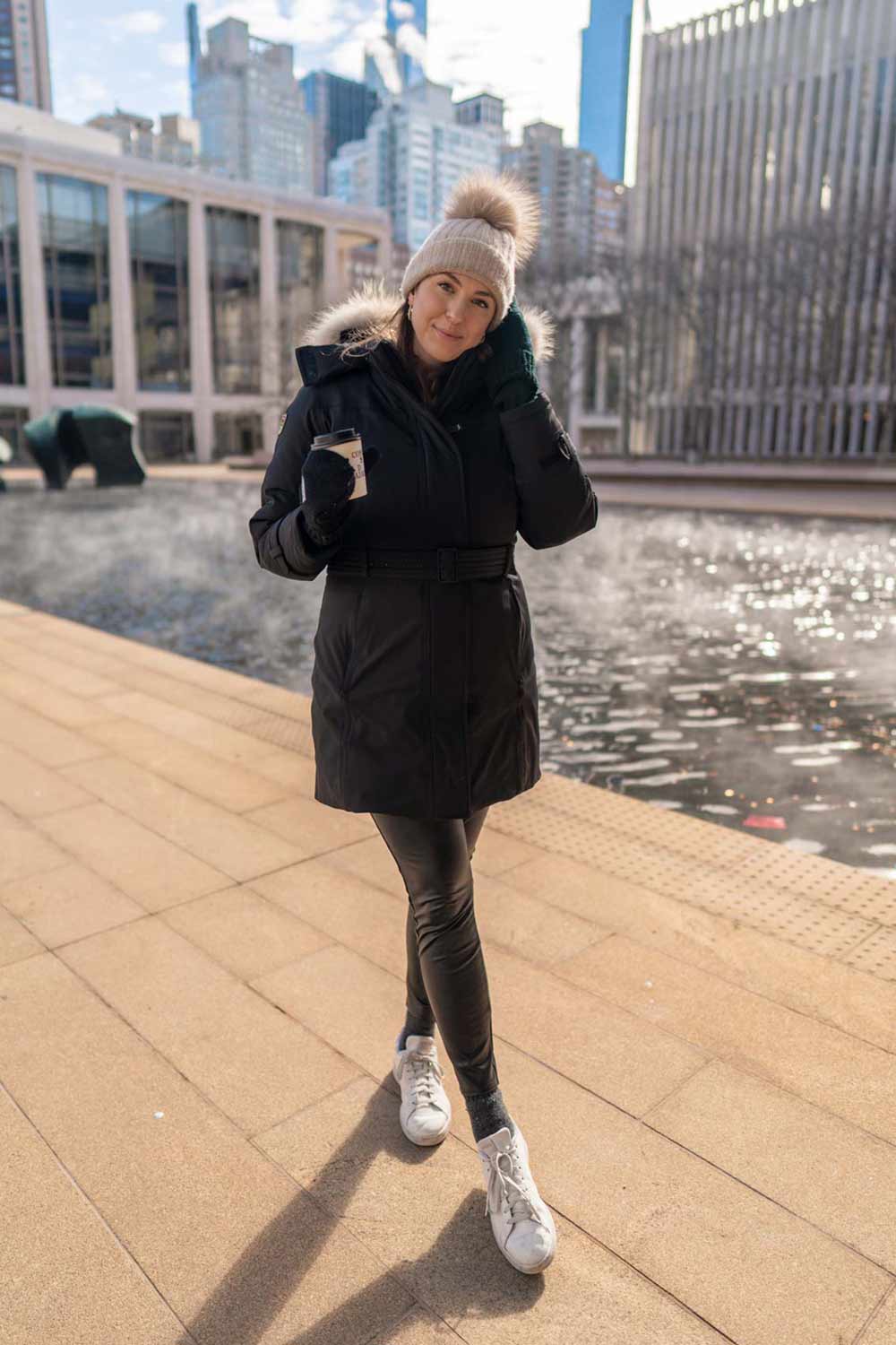 Black Parka with Fur Trim and Green Gloves — New York Winter Outfit