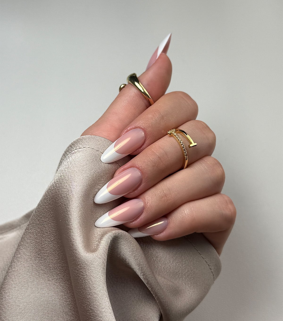 Crisp White Chrome French Tip Long Sharp Almond Nails — Nude Chrome Nails