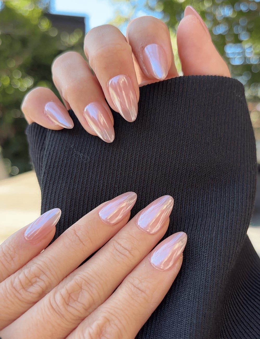 Milky Nude High-Shine Chrome Short Almond Nails, Close-Up Take — Nude Chrome Nails