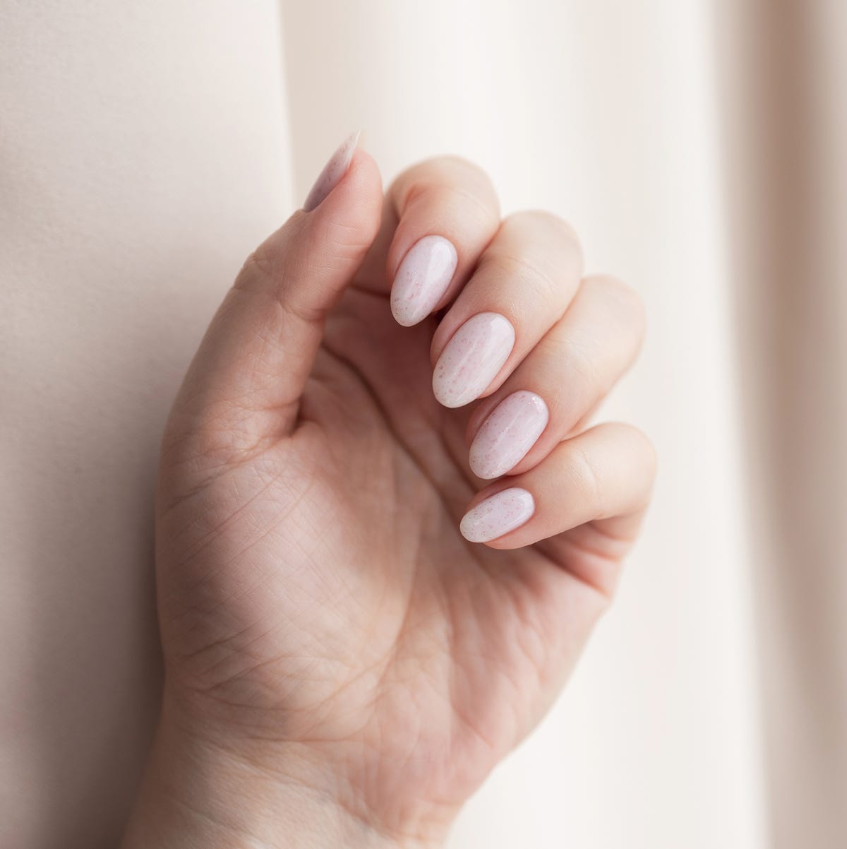 Nude With Gold Glitter Tips Medium Almond Nails — Nude Nails