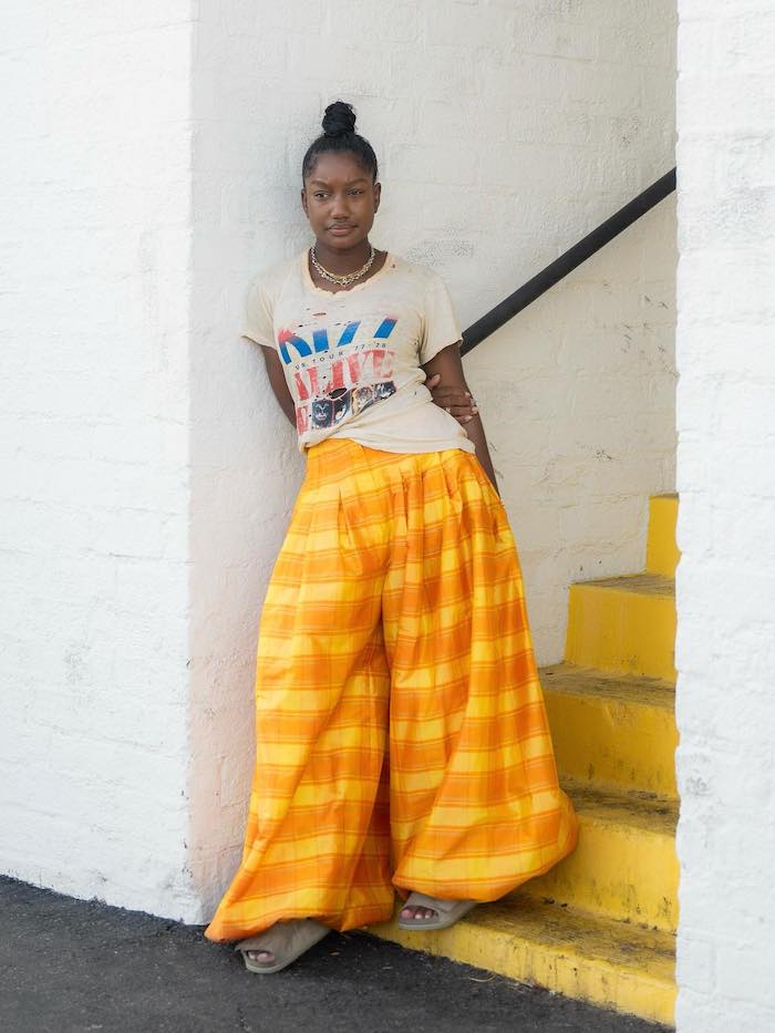 Orange Plaid Pants with Cream Graphic T-Shirt Orange Plaid Pants with Cream Graphic T-Shirt — Orange Outfits