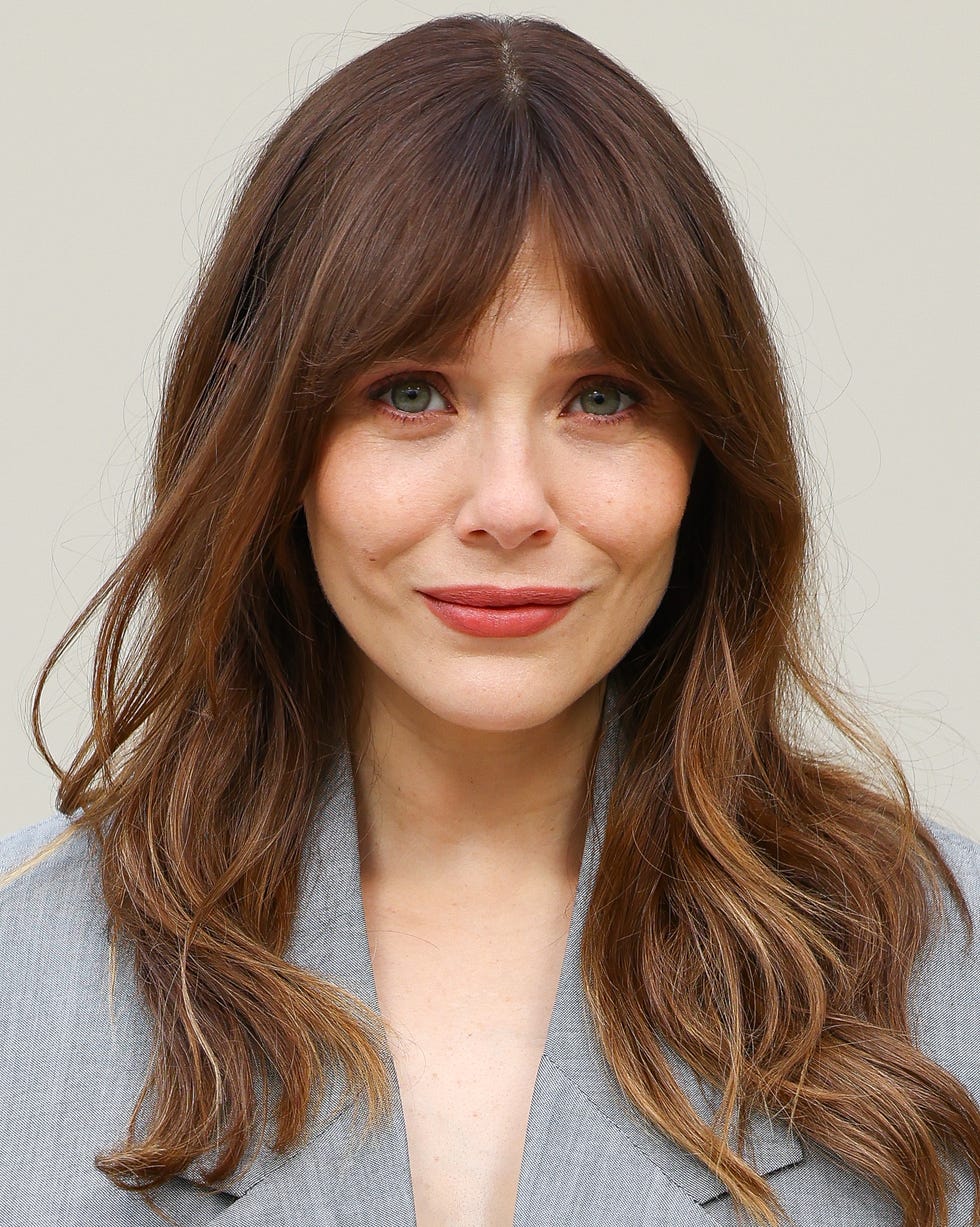 Mid-Back Layers With Wispy Bangs And Auburn Base — Oval Face Haircuts
