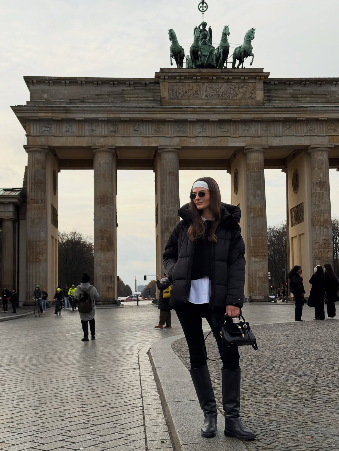 Oversized Puffer Jacket With Knee High Boots